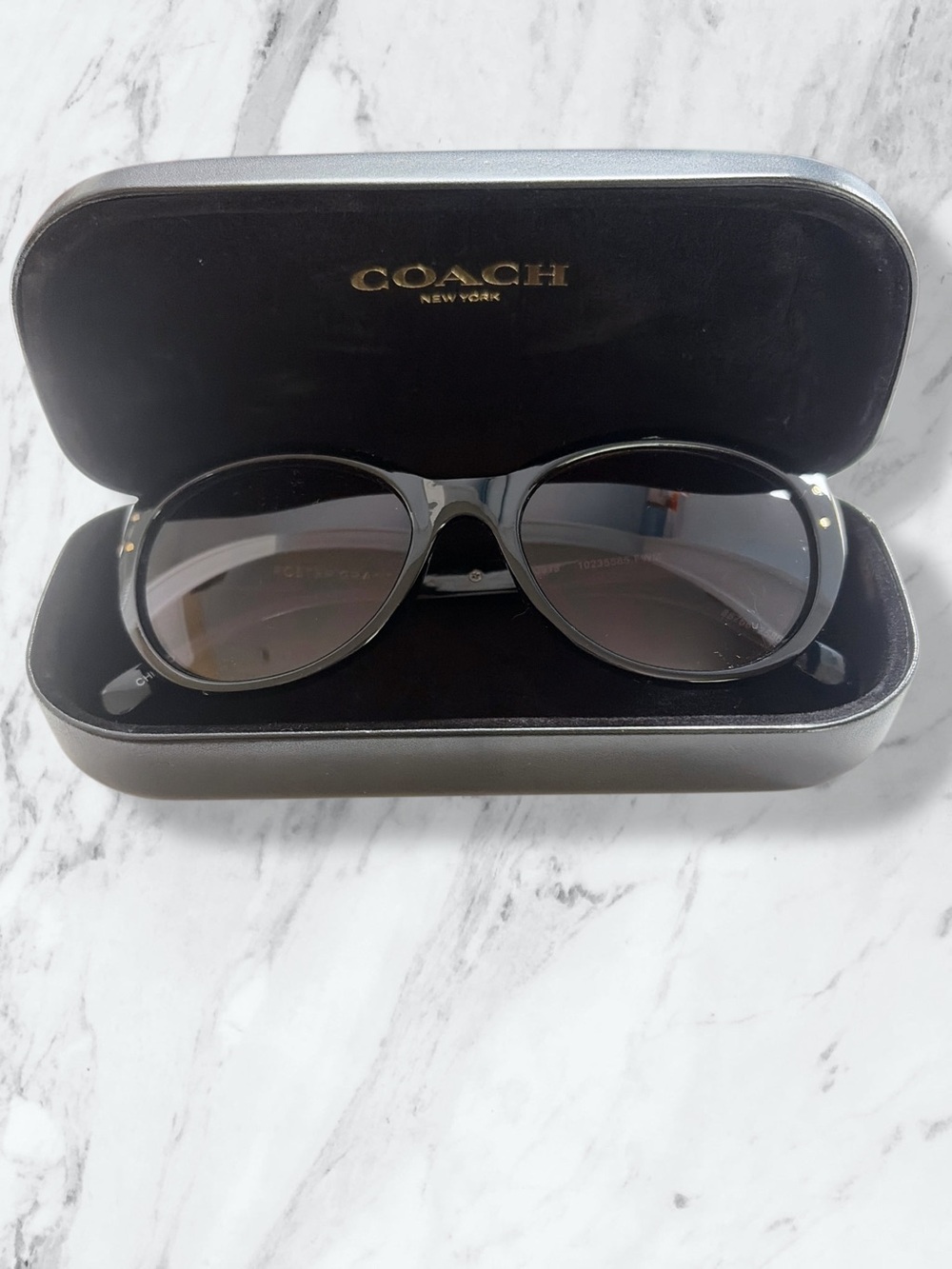 Foster Grant sunglasses in Coach case
